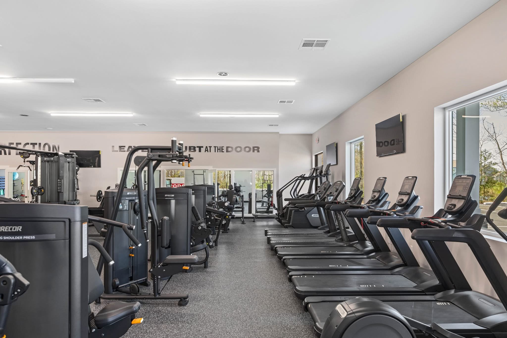 Cardio and strength equipment inside CustomFit360
